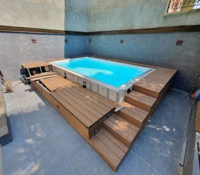 Costruzione su misura di copertura piscina decking da esterno